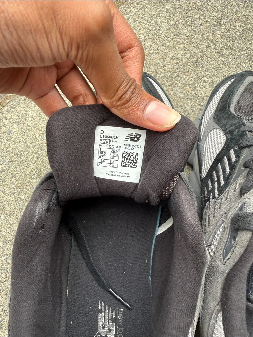 New Balance Black and Gray Men's Athletic Sneakers with Red Tongue Accents